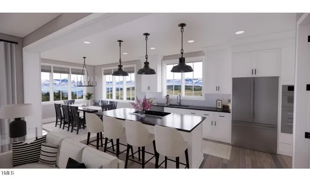 a bedroom with a large bed and a large window