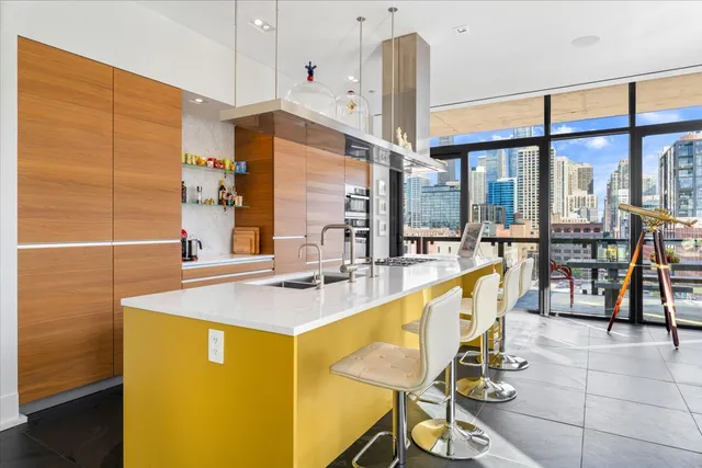 a view of a kitchen with living room and furniture