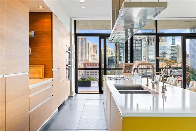 a very nice looking living room with a large window