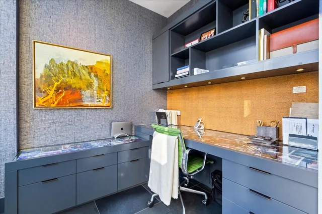 a view of a kitchen with furniture and a window