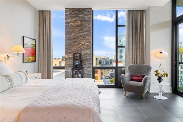 a bathroom with a tub and shower