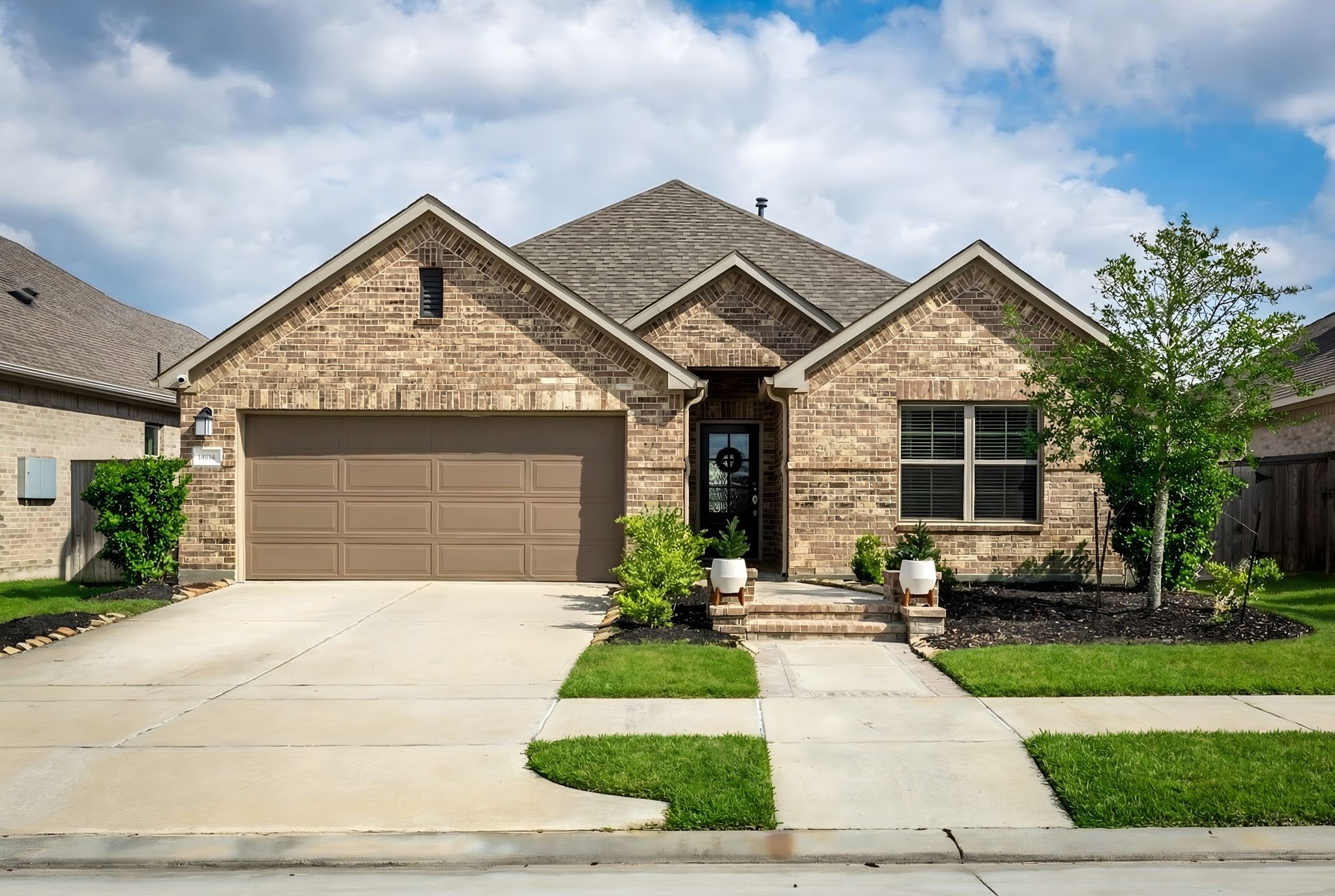 14914 Big Bend Ranch Drive Cypress, TX 77433 - Photo 49 of 49 a front view of a house with garden
