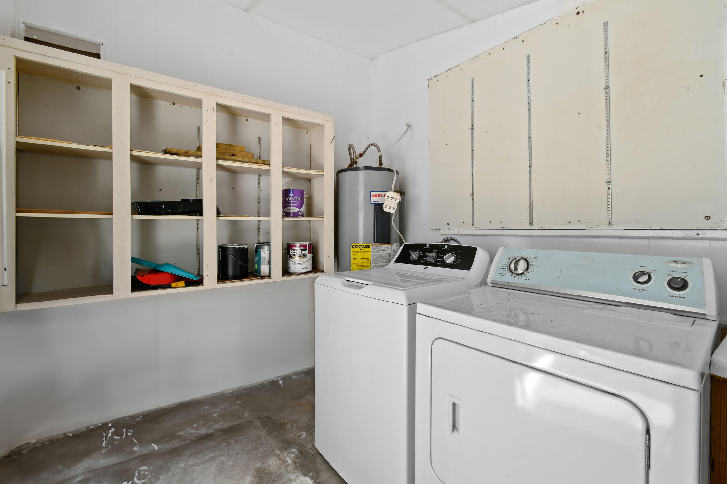 24 Southeast Fork Terrace Stuart, FL 34997 - Photo 11 of 14 a utility room with dryer and washer