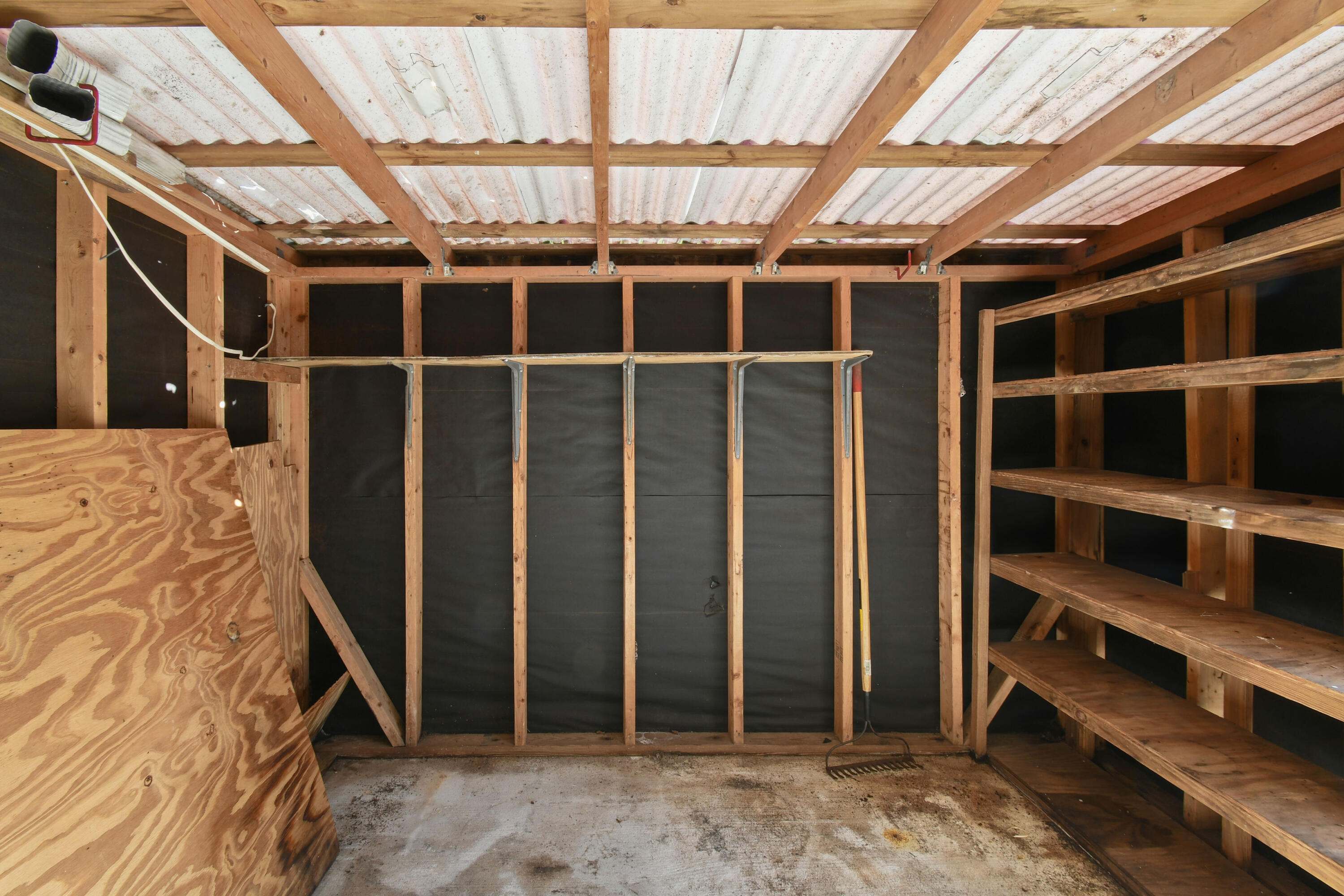 24 Southeast Fork Terrace Stuart, FL 34997 - Photo 13 of 14 a view of a room with wooden walls