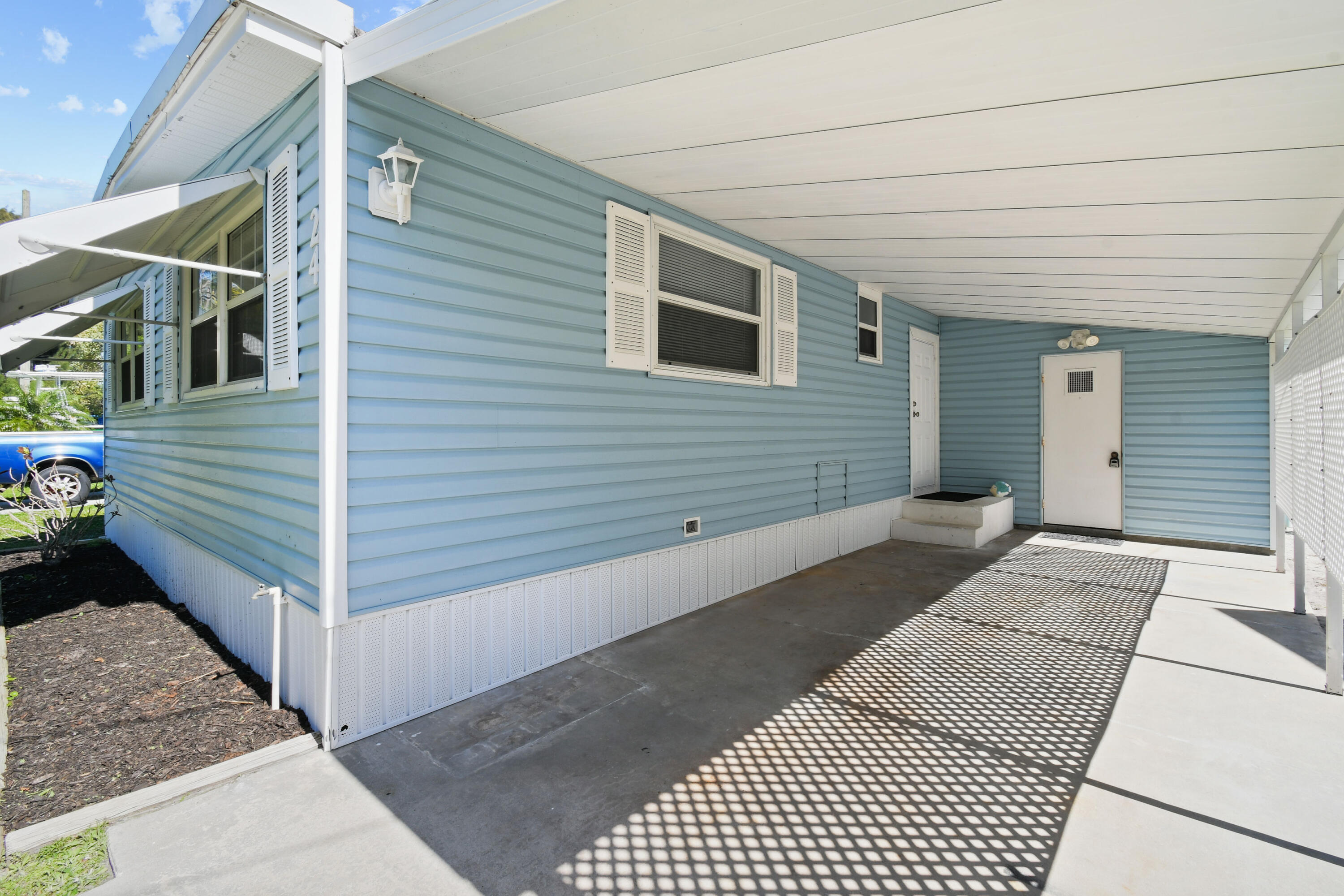 24 Southeast Fork Terrace Stuart, FL 34997 - Photo 4 of 14 a view of a house with a yard