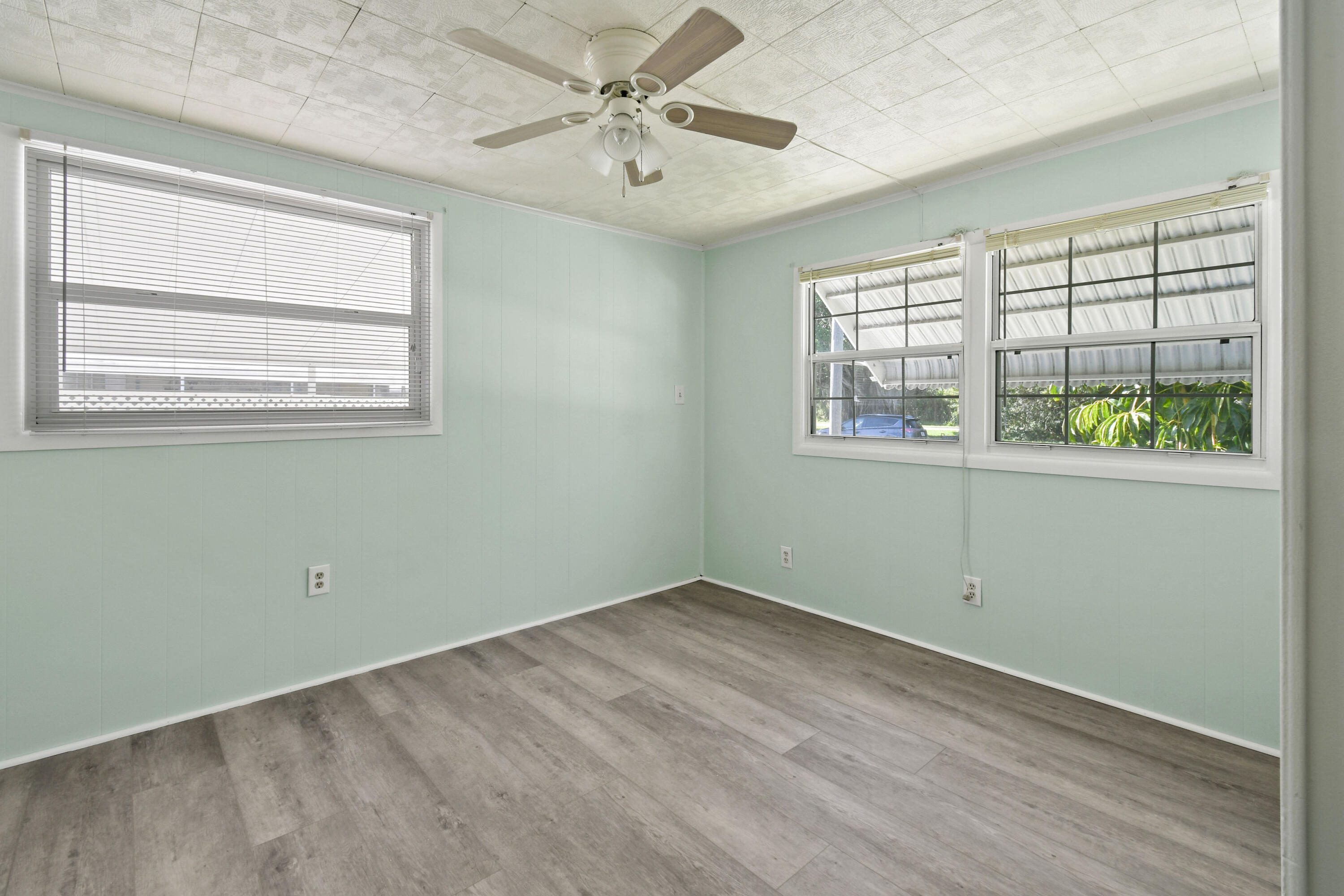 24 Southeast Fork Terrace Stuart, FL 34997 - Photo 9 of 14 an empty room with windows