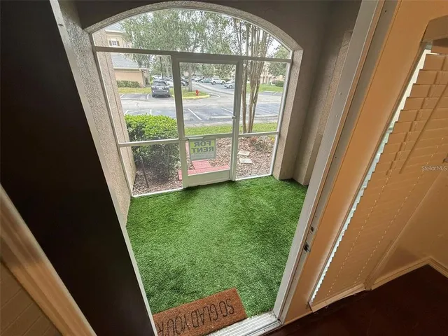 a view of a door in front of a window