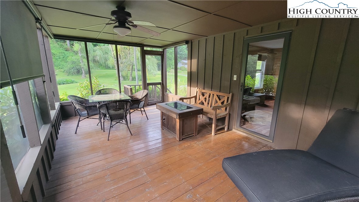 252 Goshen Creek Lane Boone, NC 28607 - Photo 15 of 31 a living room with furniture and a large window