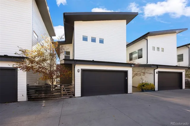 a front view of a house with a garage