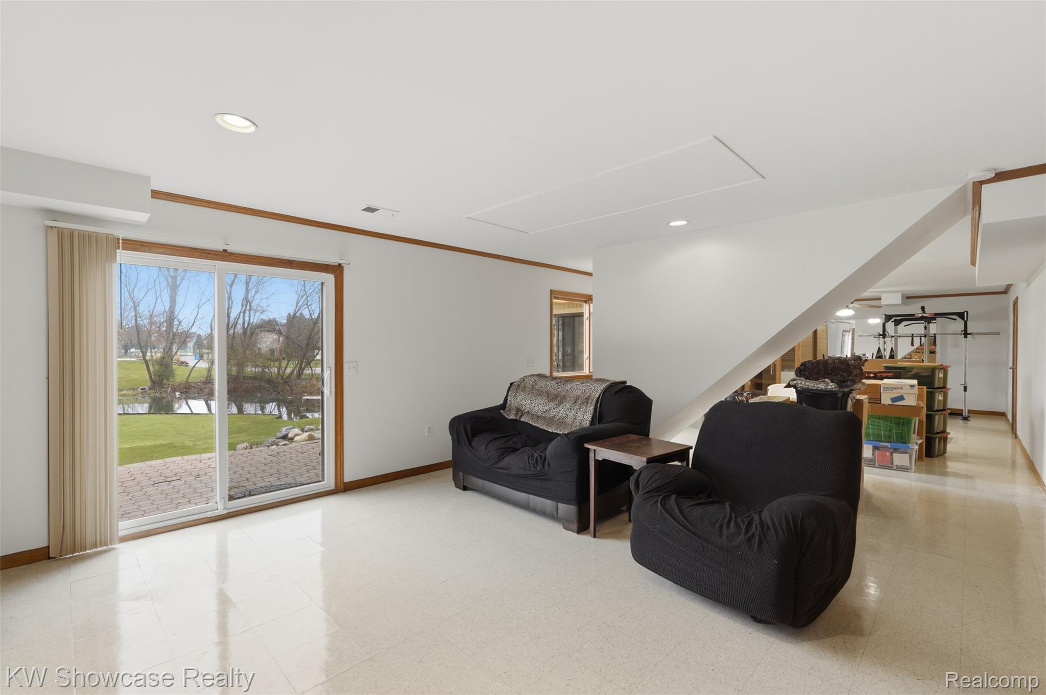 3330 Benstein Road Commerce Township, MI 48382 - Photo 16 of 40 LL Living room w/ access to patio