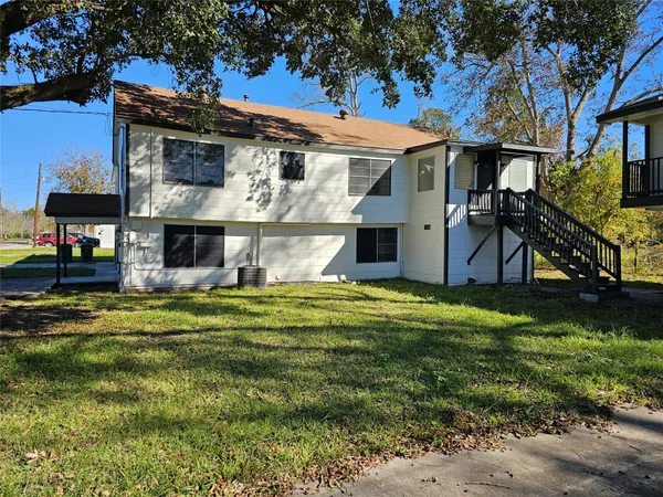 a view of a house with a swimming pool