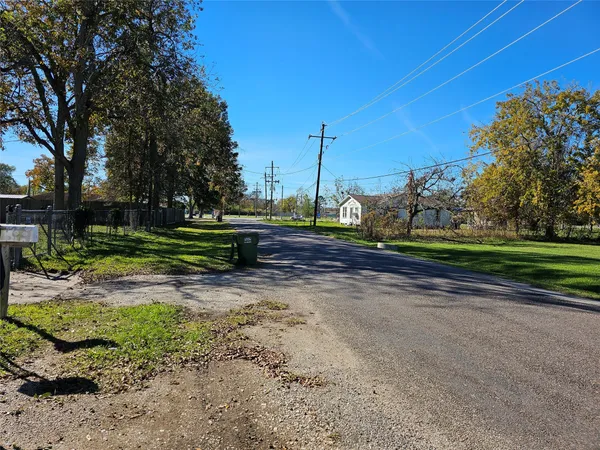 a view of backyard with green space