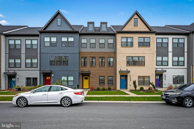 a car parked in front of a house