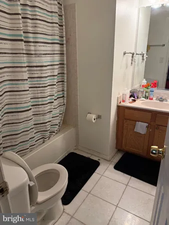 a bathroom with a toilet and a sink