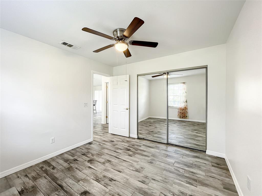 2887 Southwest Ann Arbor Road Port St. Lucie, FL 34953 - Photo 25 of 31 a view of empty room with wooden floor