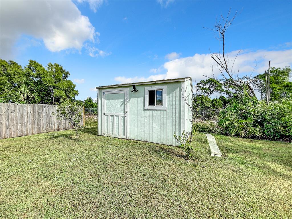 2887 Southwest Ann Arbor Road Port St. Lucie, FL 34953 - Photo 31 of 31 a view of a backyard