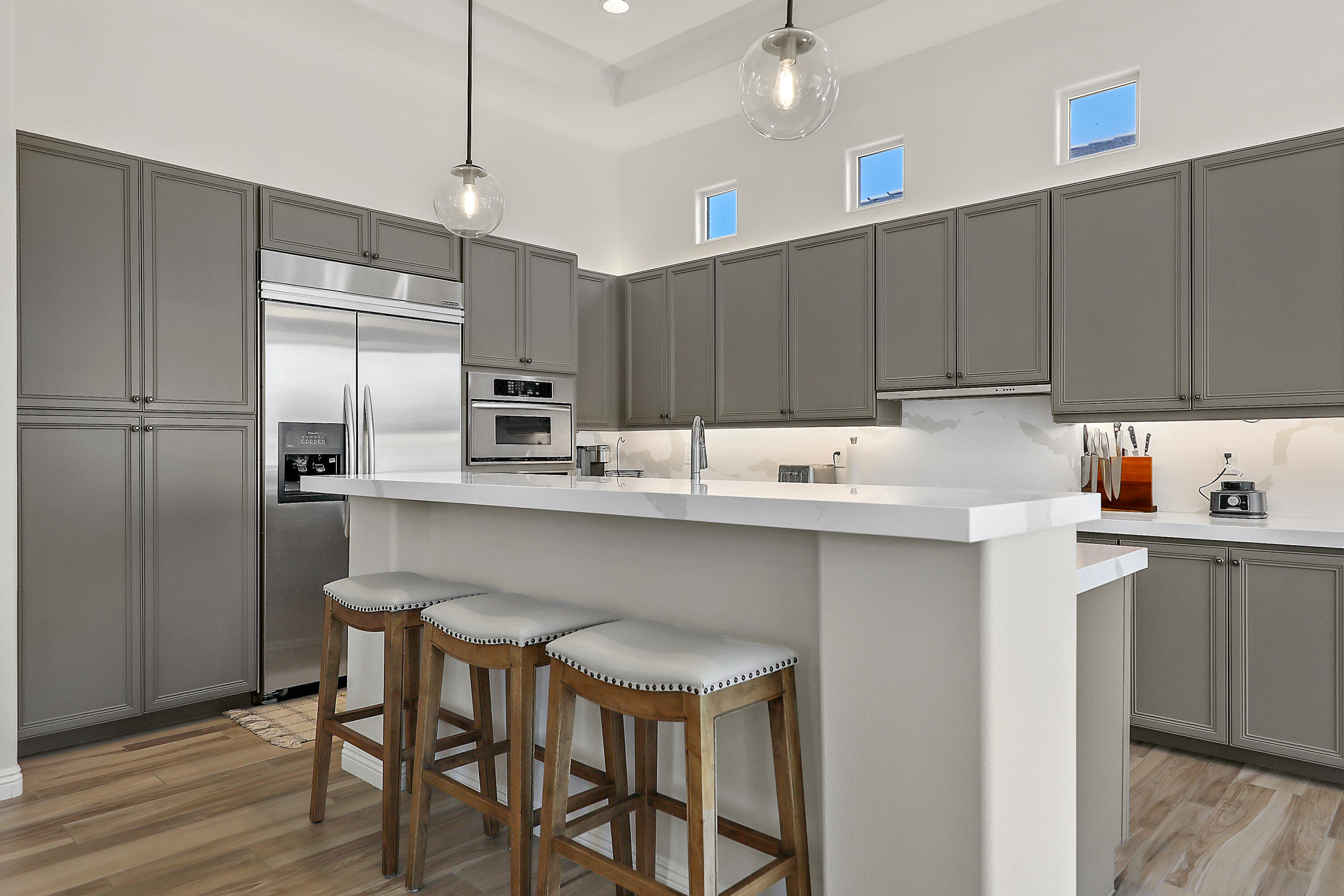 80345 Camarillo Way La Quinta, CA 92253 - Photo 12 of 40 a kitchen with a sink cabinets and stainless steel appliances