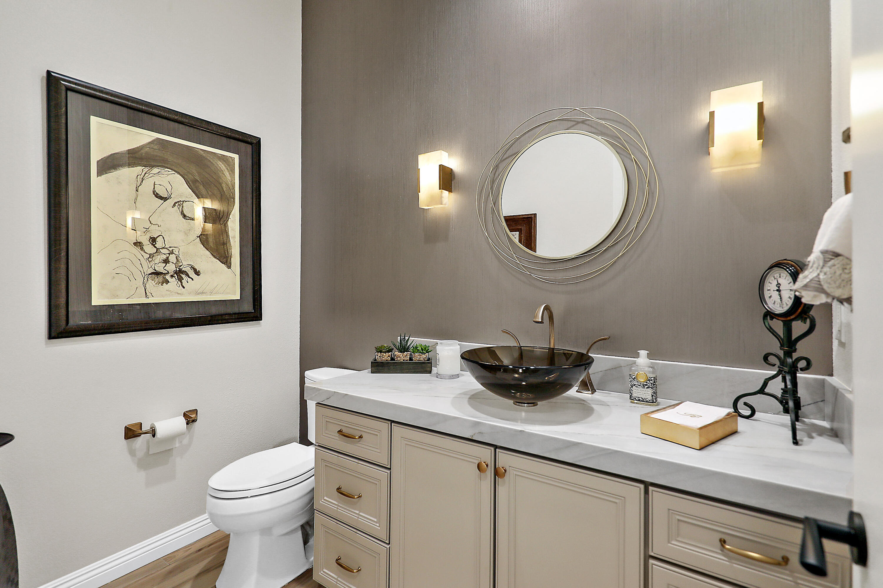 80345 Camarillo Way La Quinta, CA 92253 - Photo 15 of 40 a bathroom with a toilet a sink and mirror