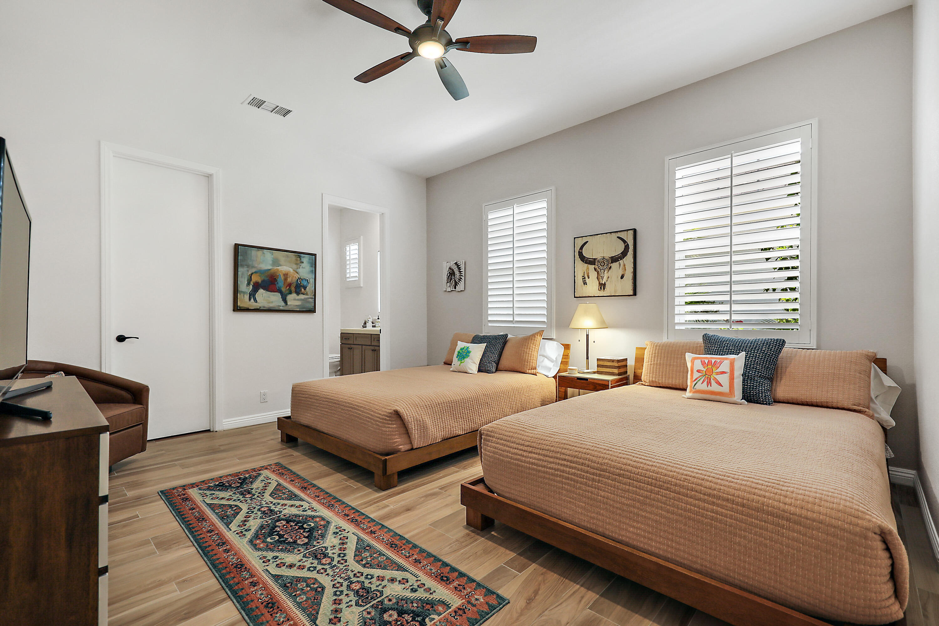 80345 Camarillo Way La Quinta, CA 92253 - Photo 23 of 40 a bedroom with two beds and a window