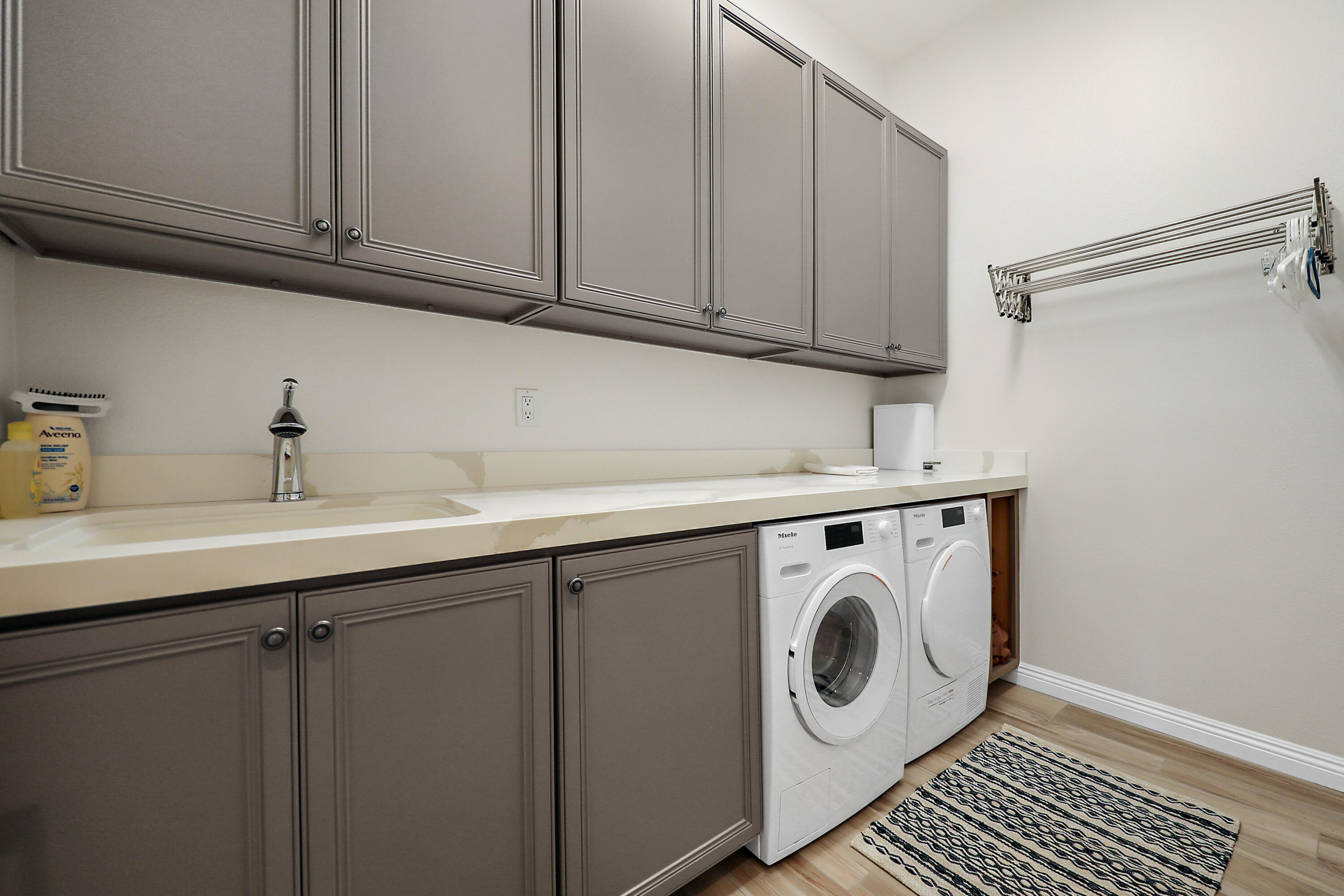 80345 Camarillo Way La Quinta, CA 92253 - Photo 25 of 40 a utility room with dryer and washer