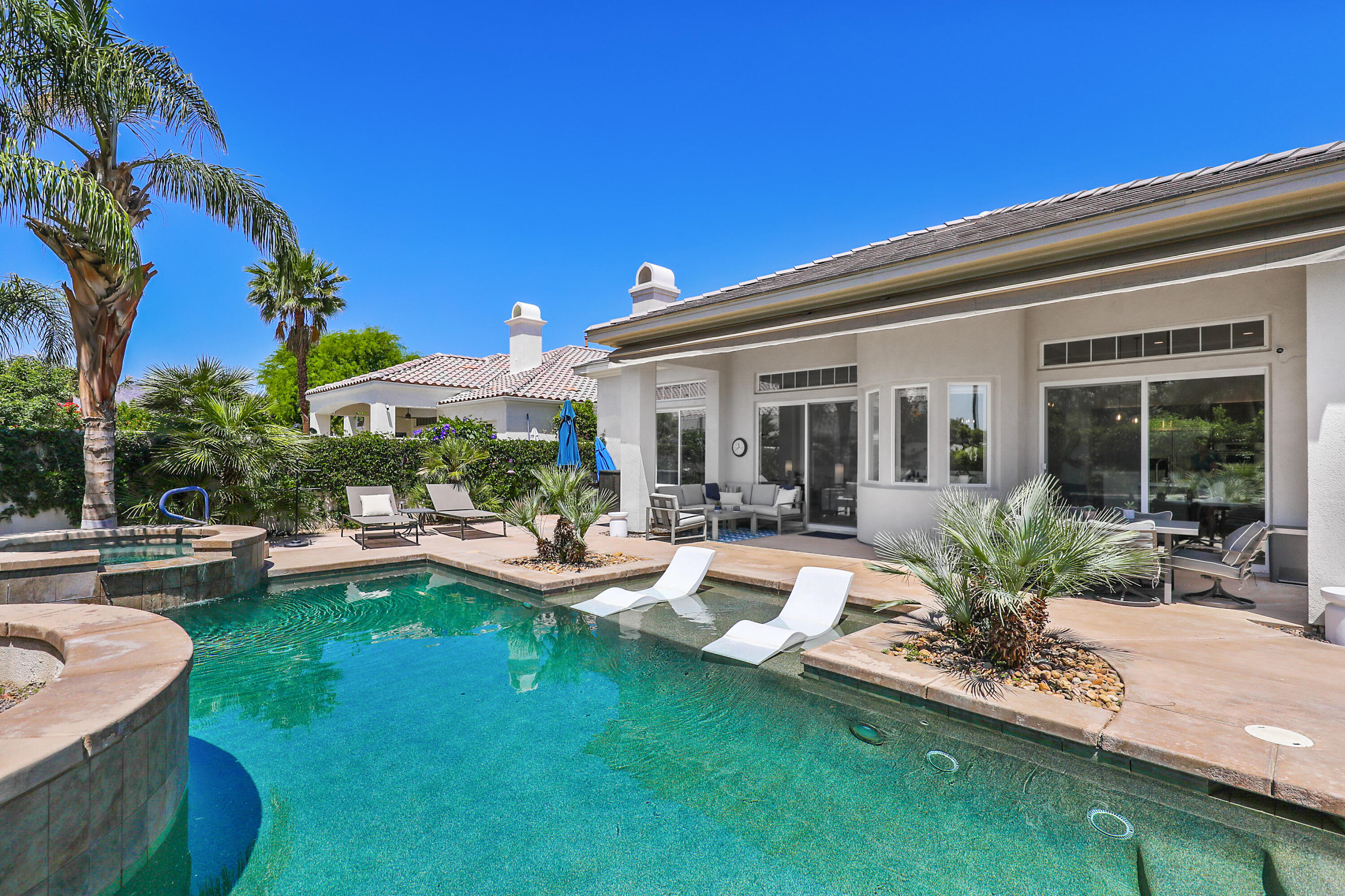 80345 Camarillo Way La Quinta, CA 92253 - Photo 30 of 40 a view of a house with backyard porch and sitting area
