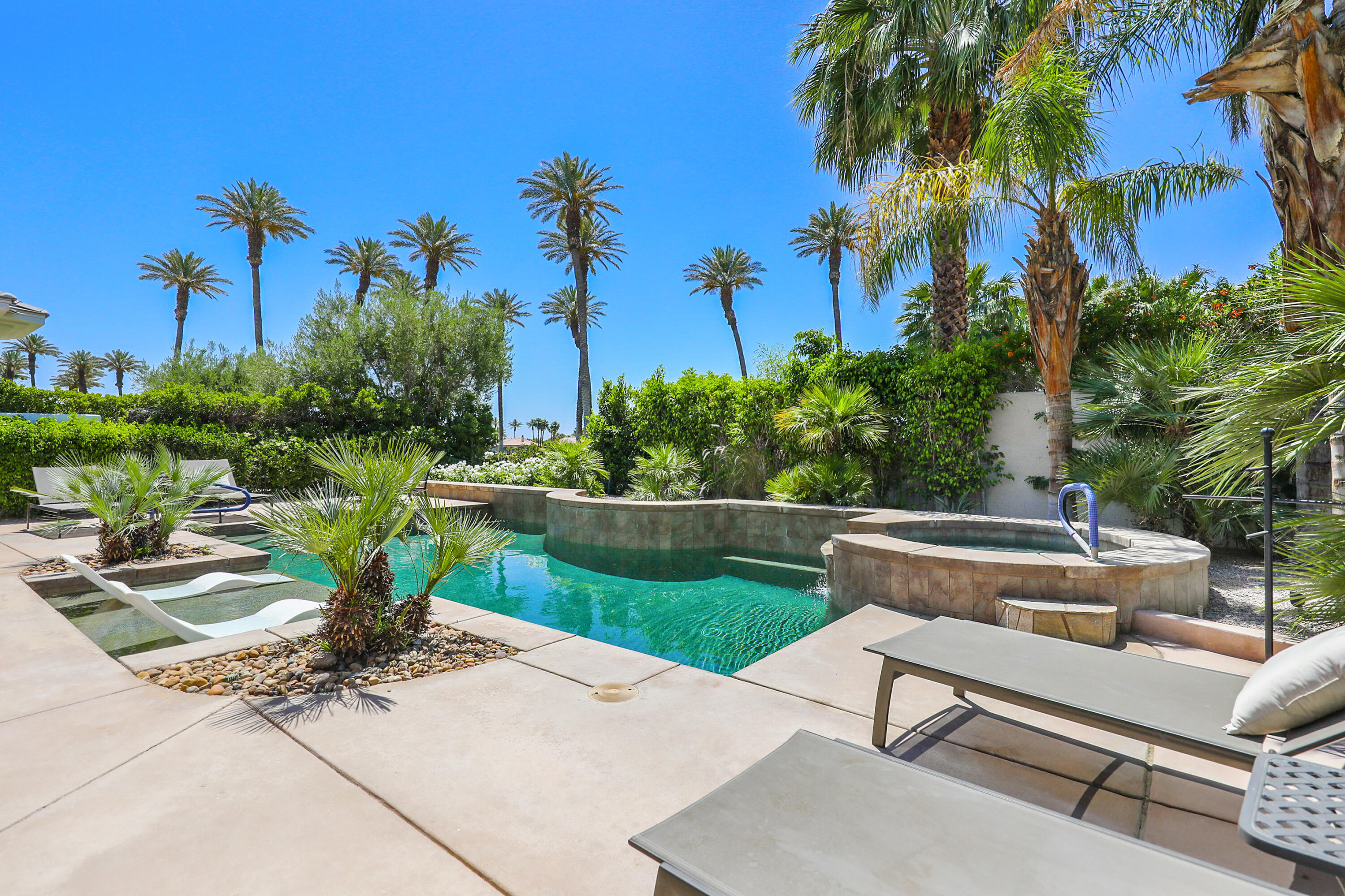 80345 Camarillo Way La Quinta, CA 92253 - Photo 32 of 40 a view of a patio with a table and chairs