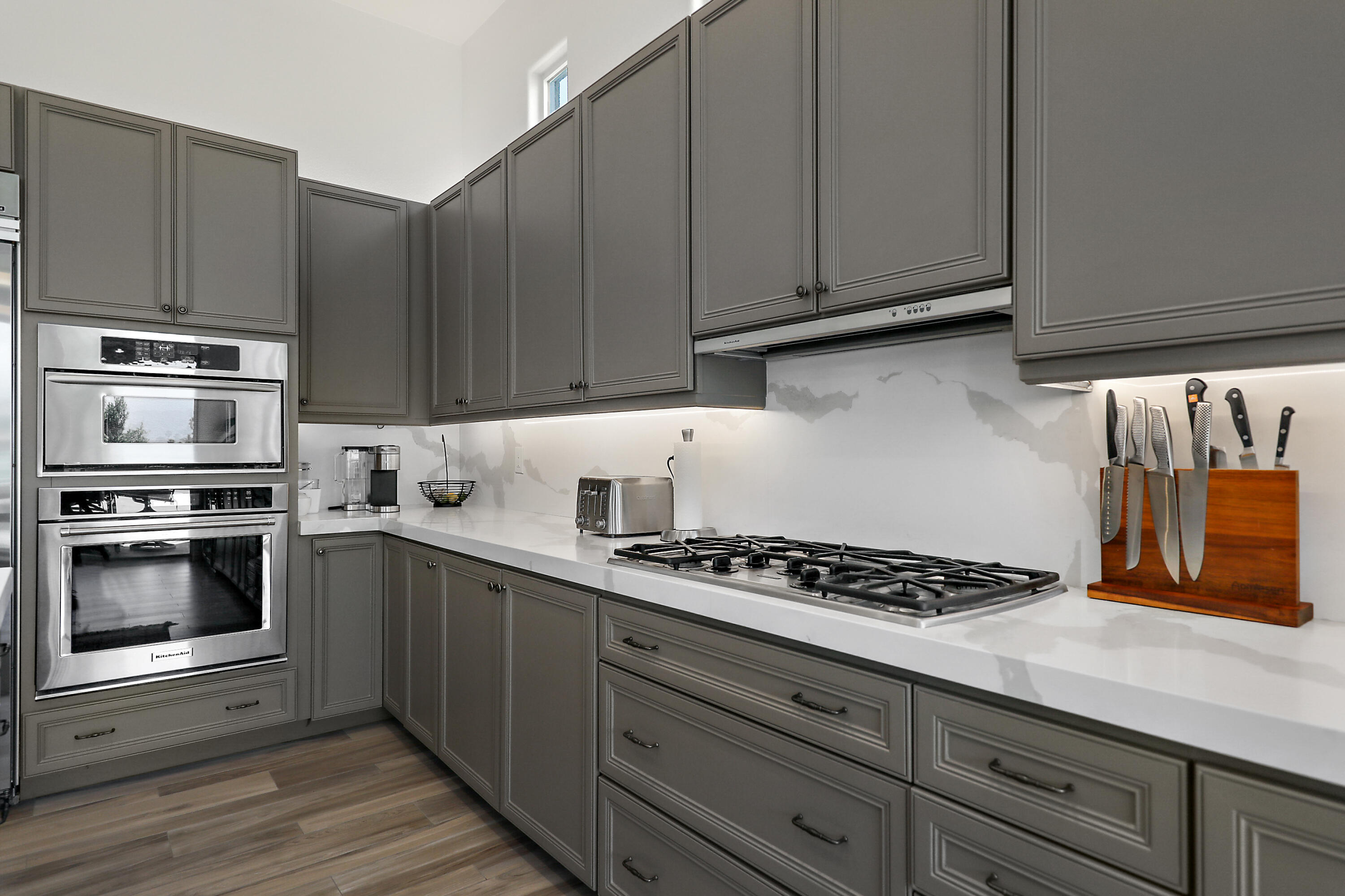 80345 Camarillo Way La Quinta, CA 92253 - Photo 4 of 40 a kitchen with granite countertop cabinets and steel stainless steel appliances