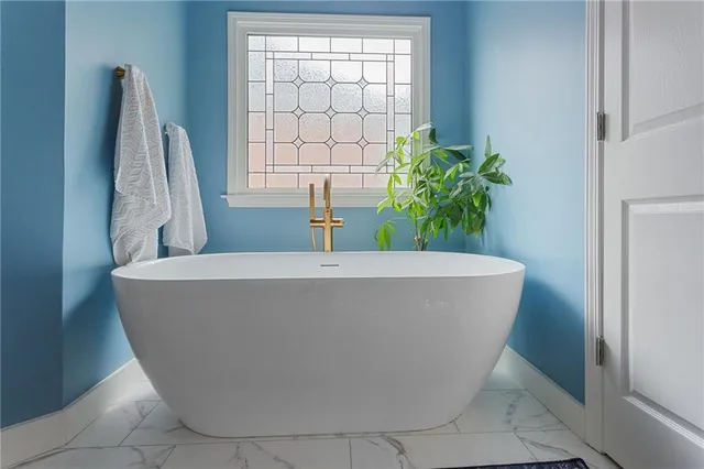 a view of a bathtub in a bathroom