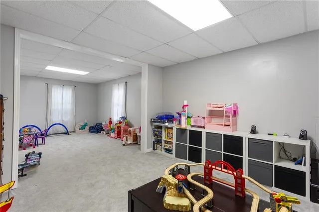 a room with furniture and toys