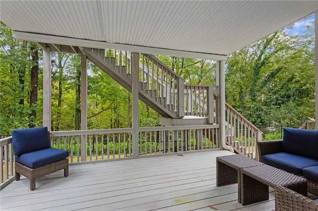 a view of a two chairs in the balcony