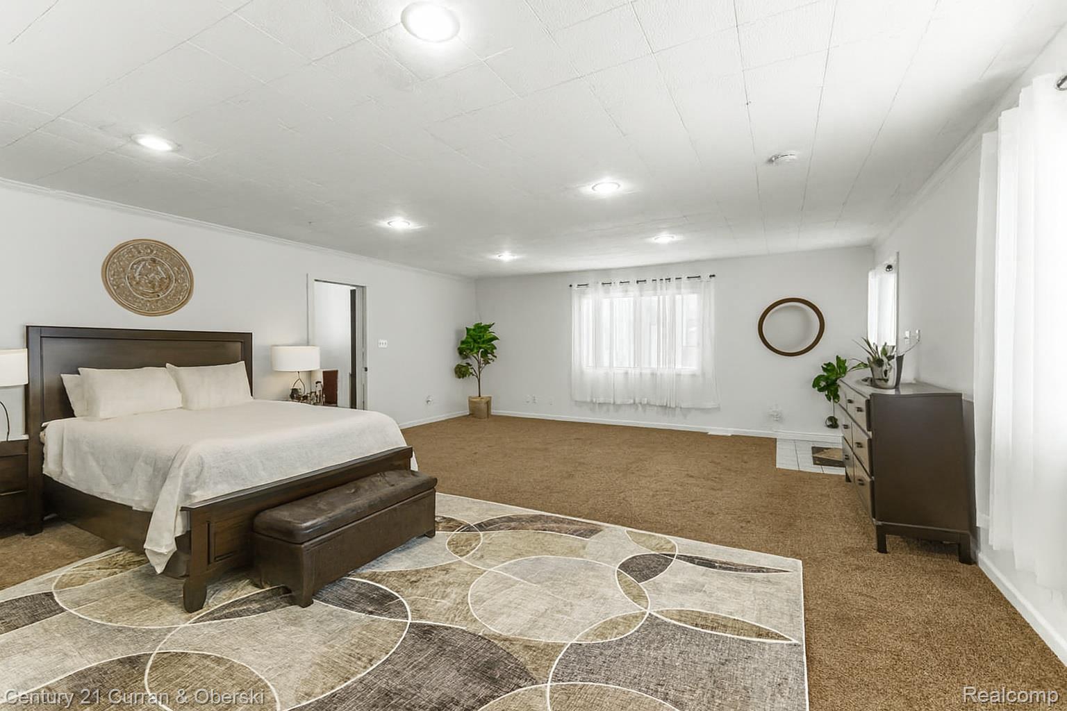 22327 Wick Road Taylor, MI 48180 - Photo 8 of 10 Carpeted bedroom with baseboards