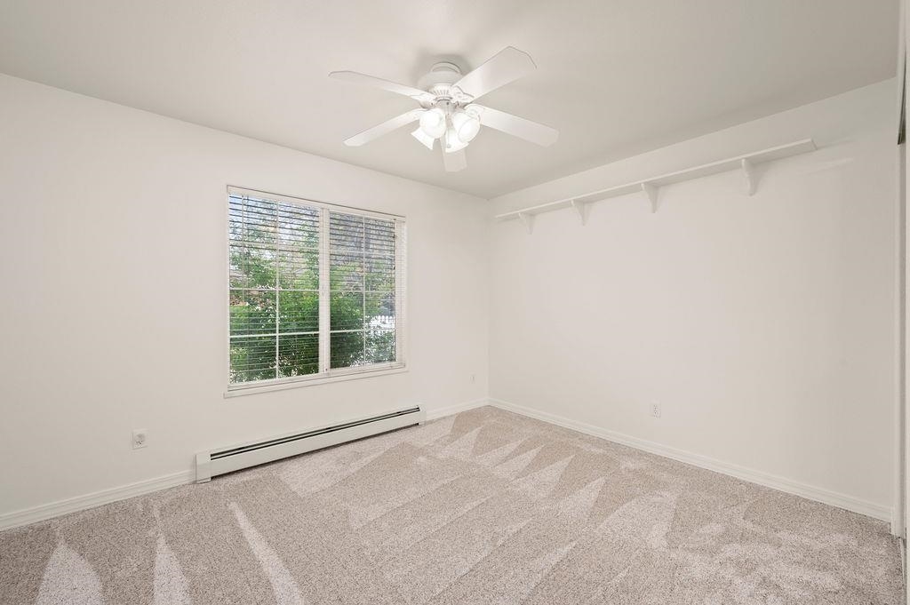 2285 Vista Rio Court Grand Junction, CO 81507 - Photo 15 of 34 an empty room with a window and a fan