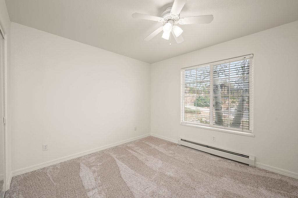 2285 Vista Rio Court Grand Junction, CO 81507 - Photo 17 of 34 an empty room with a window and a fan