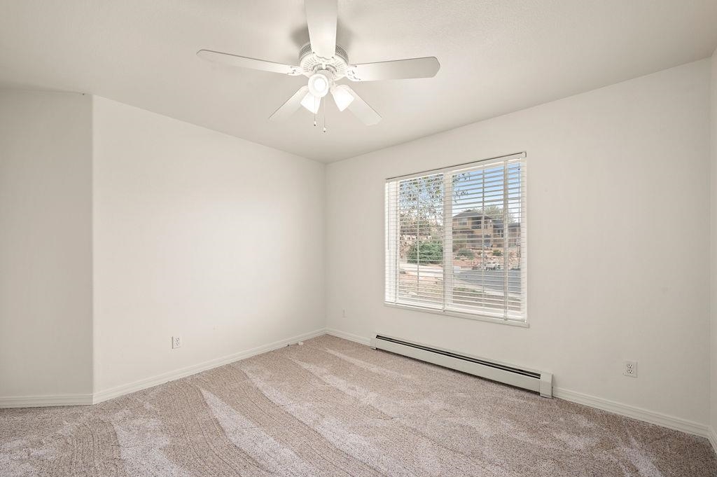 2285 Vista Rio Court Grand Junction, CO 81507 - Photo 20 of 34 an empty room with windows and fan