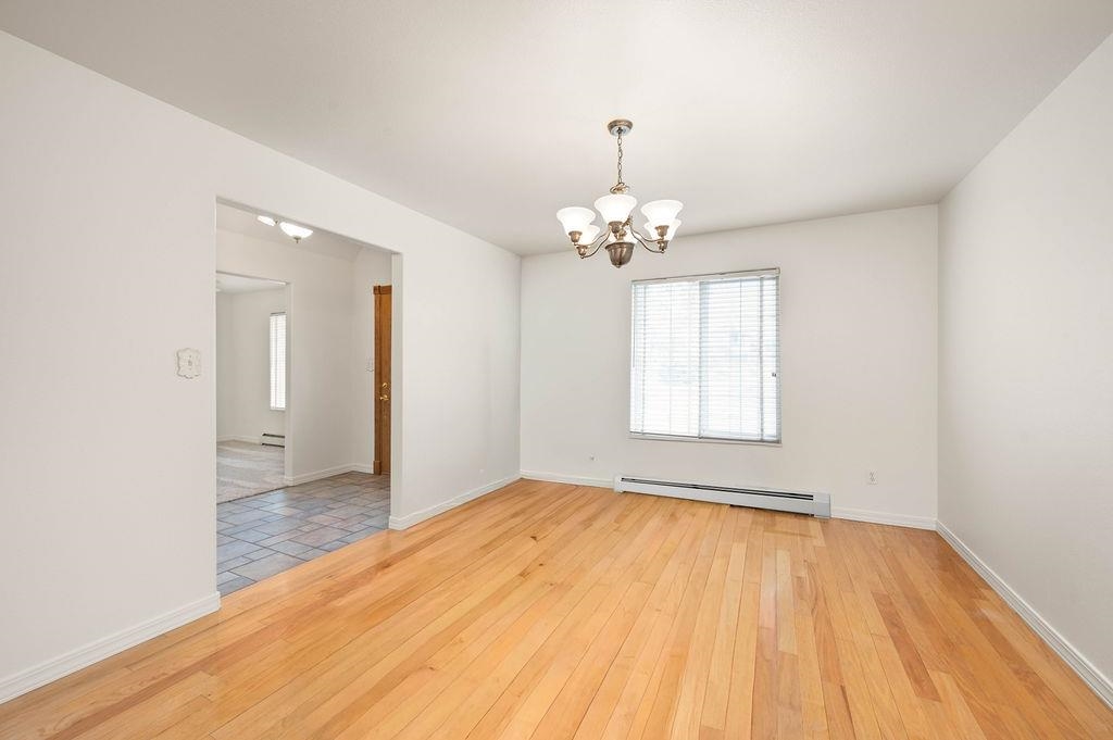 2285 Vista Rio Court Grand Junction, CO 81507 - Photo 22 of 34 a view of empty room with wooden floor and fan