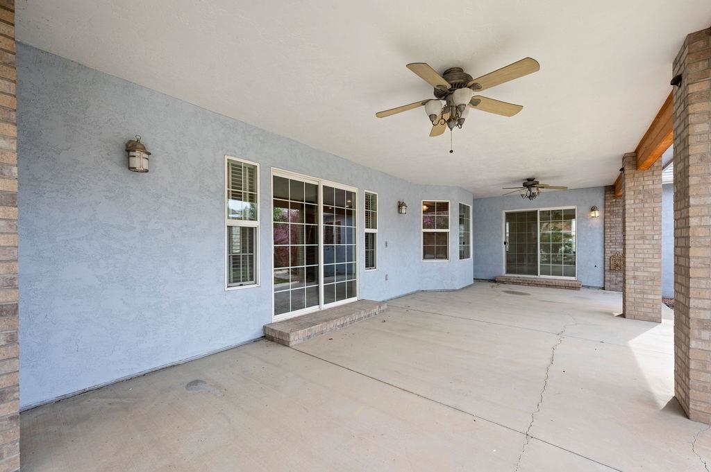 2285 Vista Rio Court Grand Junction, CO 81507 - Photo 30 of 34 a view of a livingroom with a ceiling fan and window