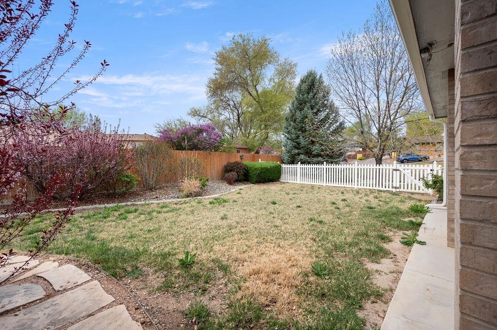 2285 Vista Rio Court Grand Junction, CO 81507 - Photo 32 of 34 a view of backyard with wooden fence