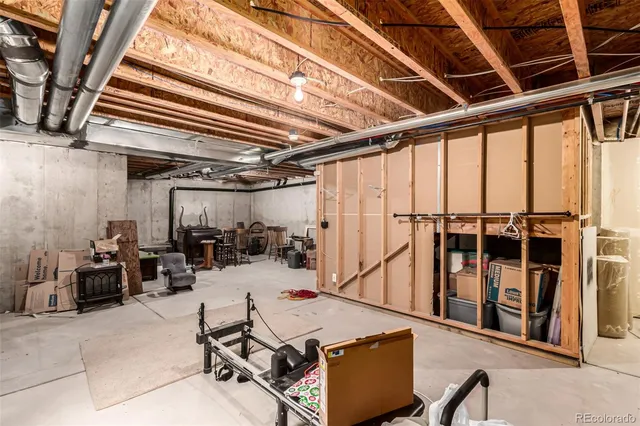 a living room with lots of furniture and lots of furniture