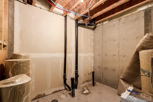 a bathroom with a shower and a toilet