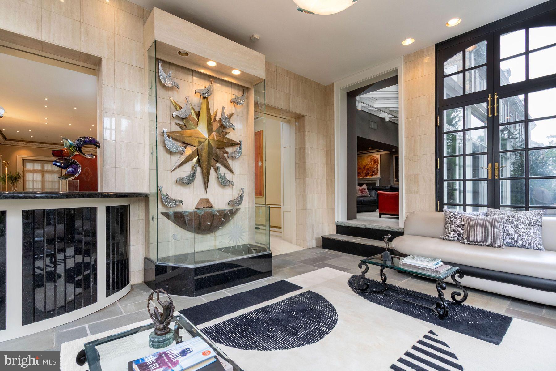 1035 Wright Drive Huntingdon Valley, PA 19006 - Photo 16 of 50 a living room with furniture a rug and a window