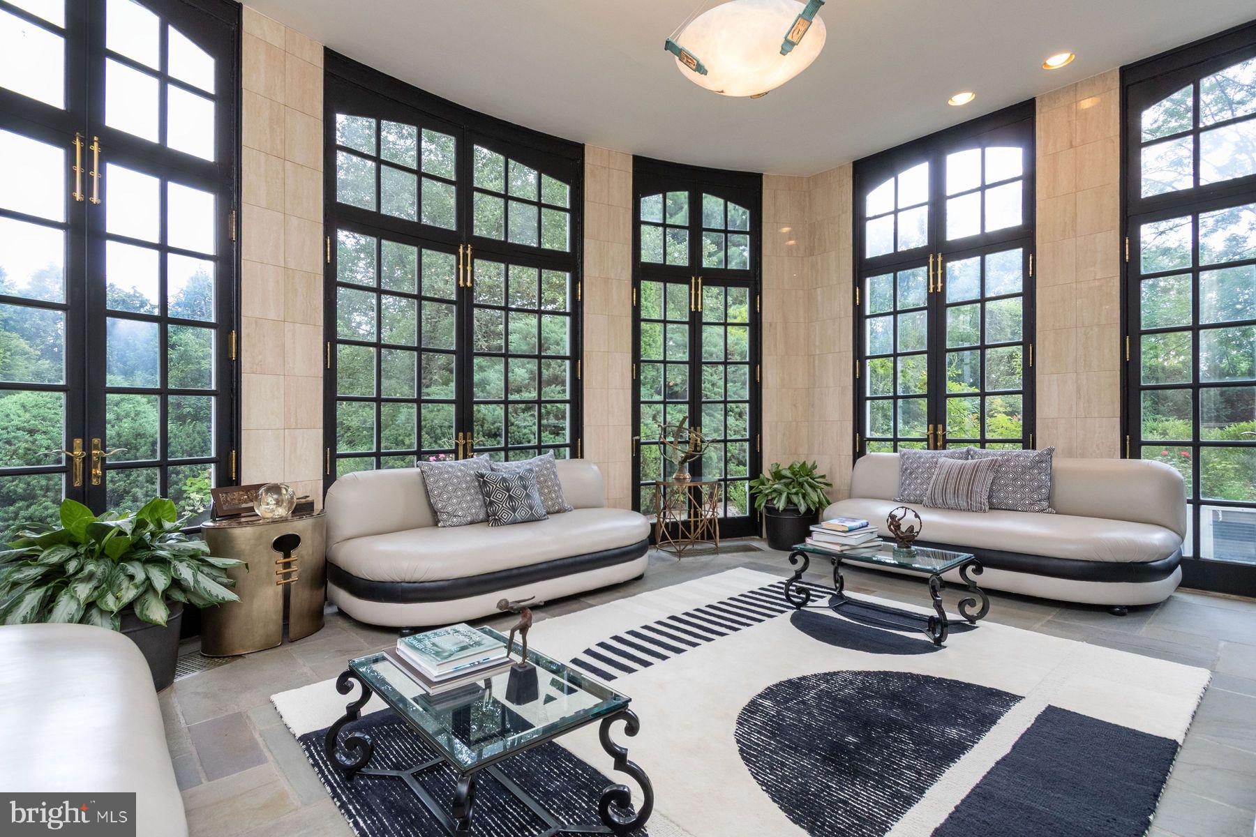 1035 Wright Drive Huntingdon Valley, PA 19006 - Photo 17 of 50 a living room with furniture and a large window