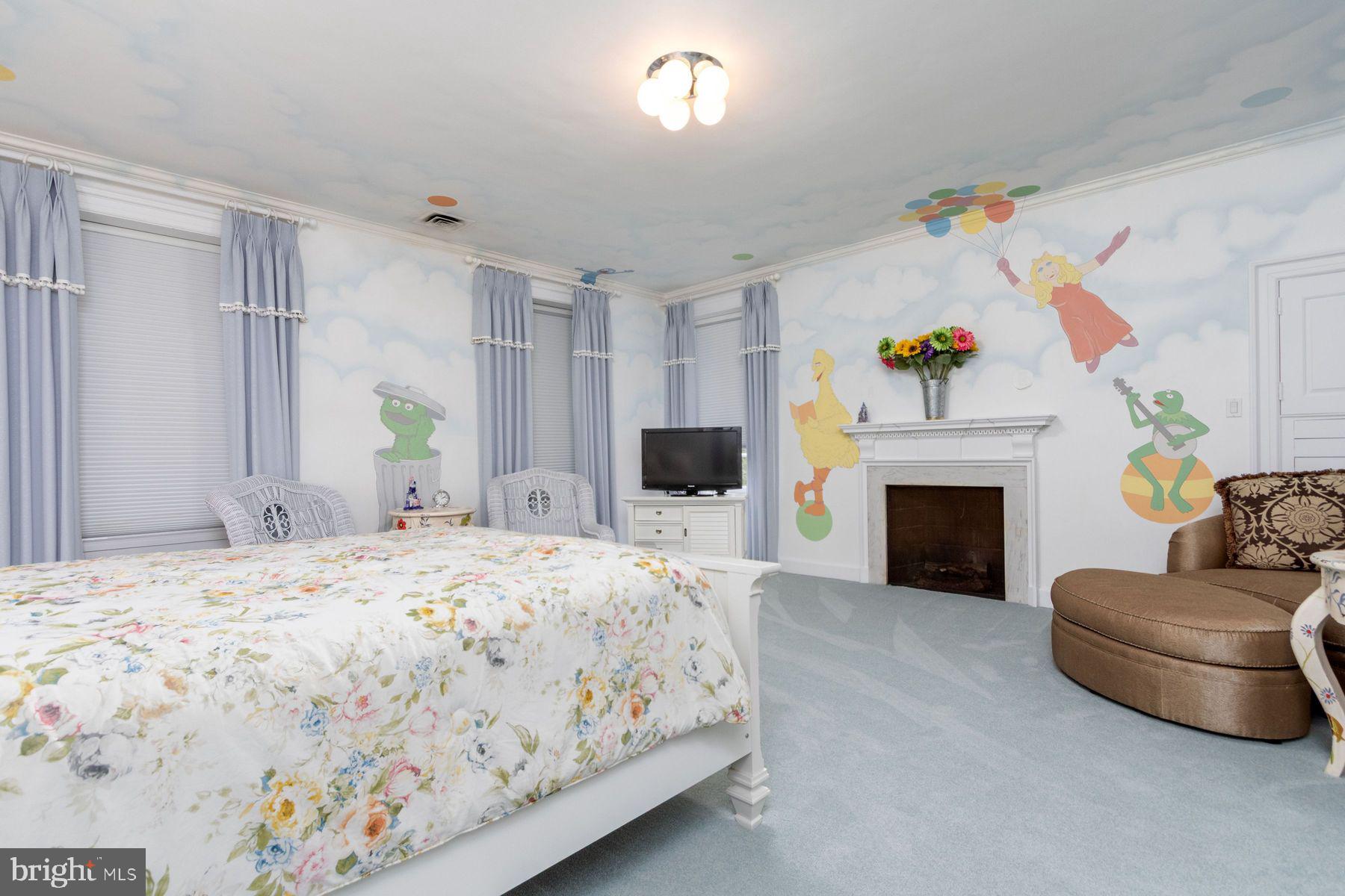 1035 Wright Drive Huntingdon Valley, PA 19006 - Photo 30 of 50 a bedroom with a bed and a couch