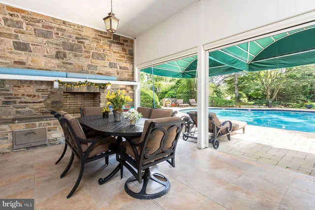 a dining area with furniture and outdoor view