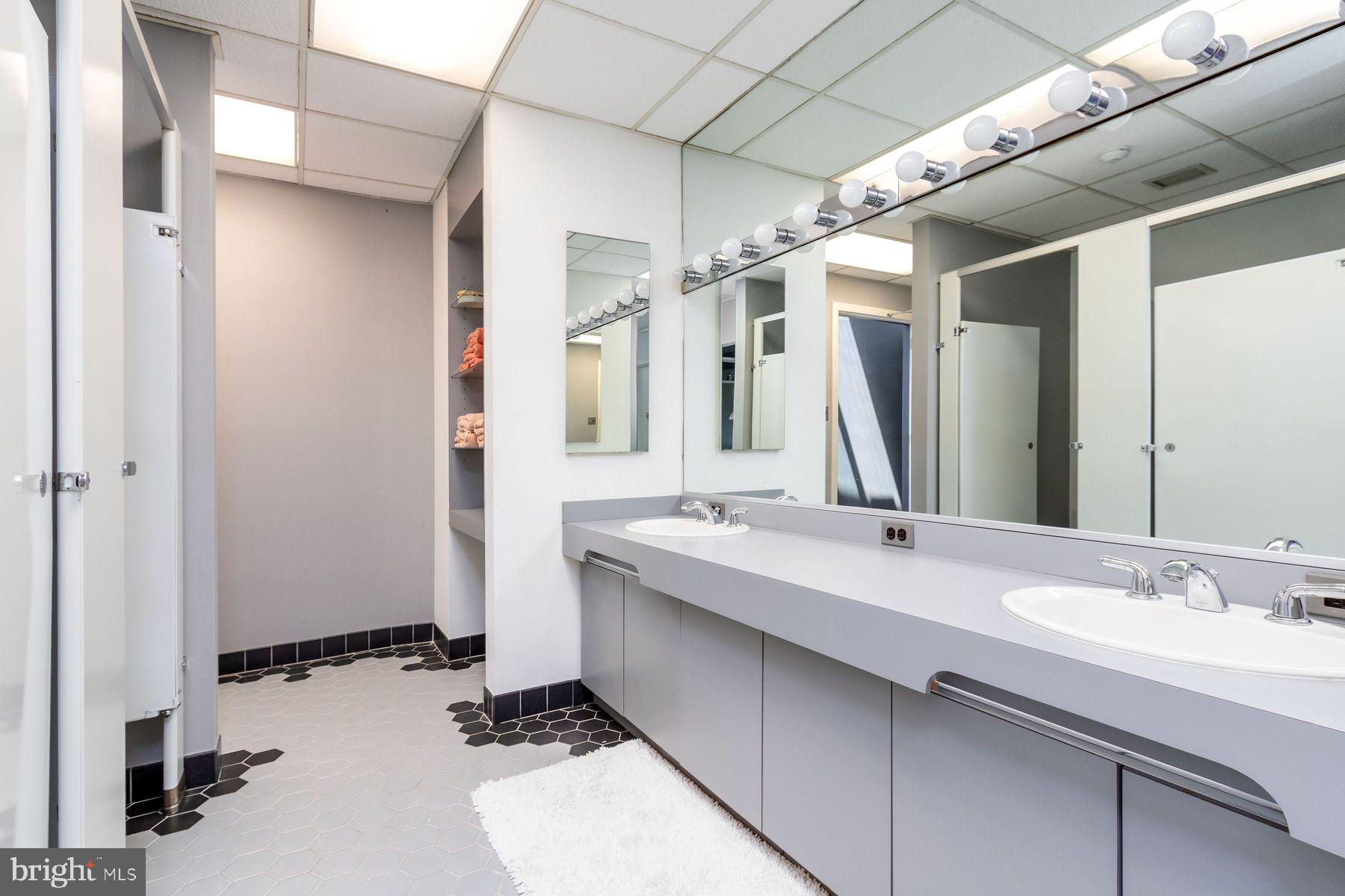 1035 Wright Drive Huntingdon Valley, PA 19006 - Photo 41 of 50 a bathroom with a double vanity sink and mirror
