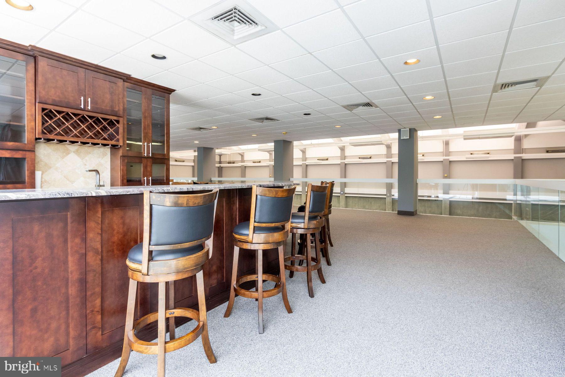 1035 Wright Drive Huntingdon Valley, PA 19006 - Photo 45 of 50 a view of a dining room with furniture and chandelier