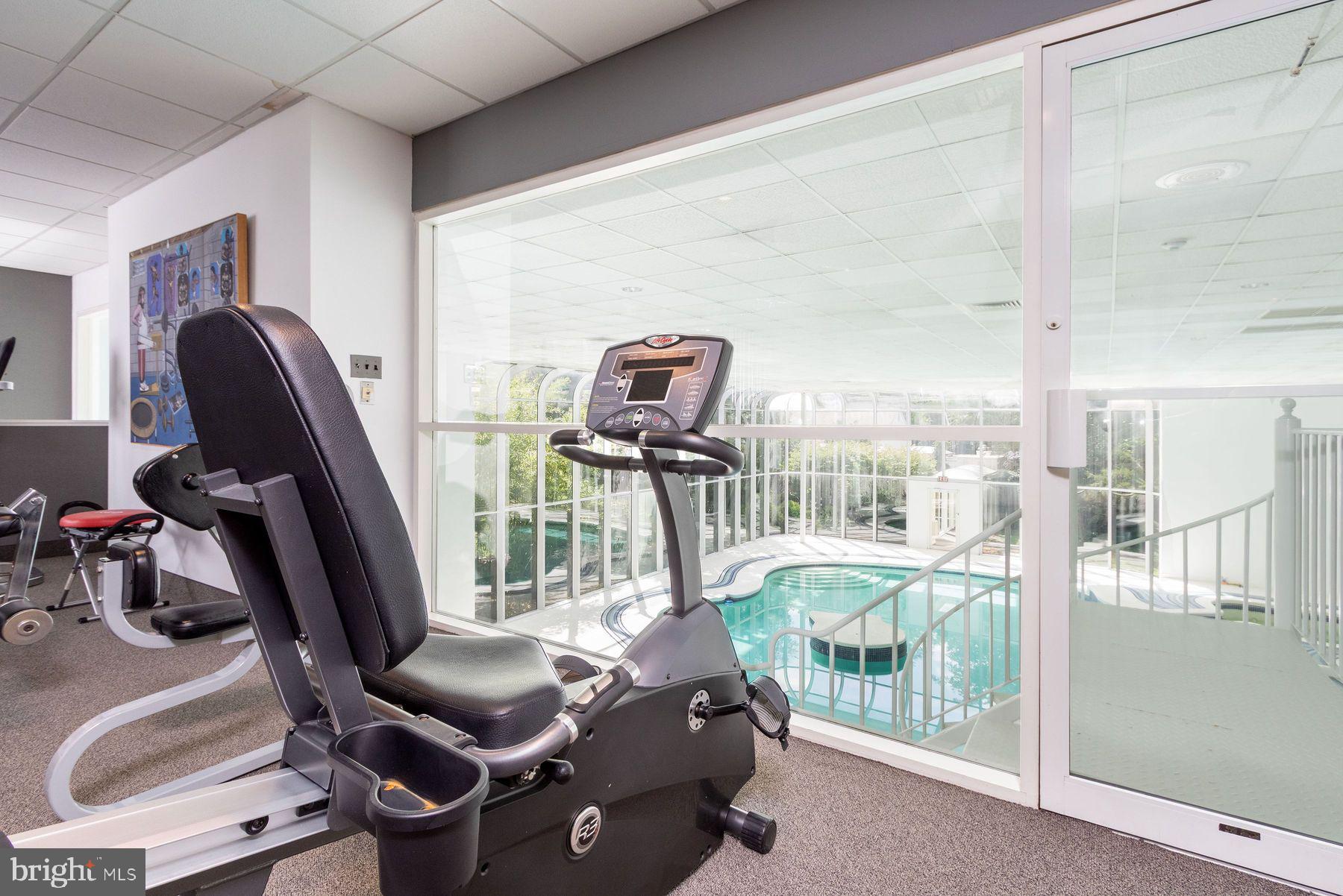 1035 Wright Drive Huntingdon Valley, PA 19006 - Photo 47 of 50 a room with gym equipment and a large window