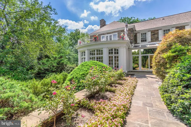 a house with garden in front of it