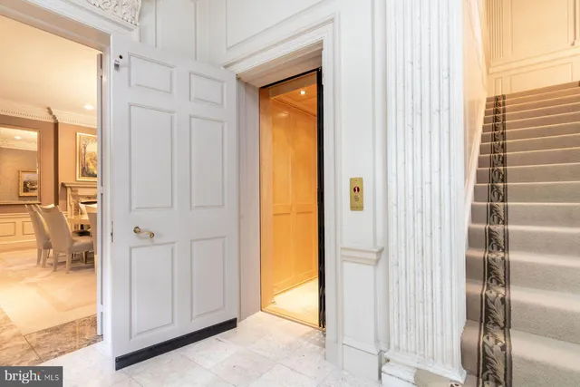 a view of a bathroom with a glass door