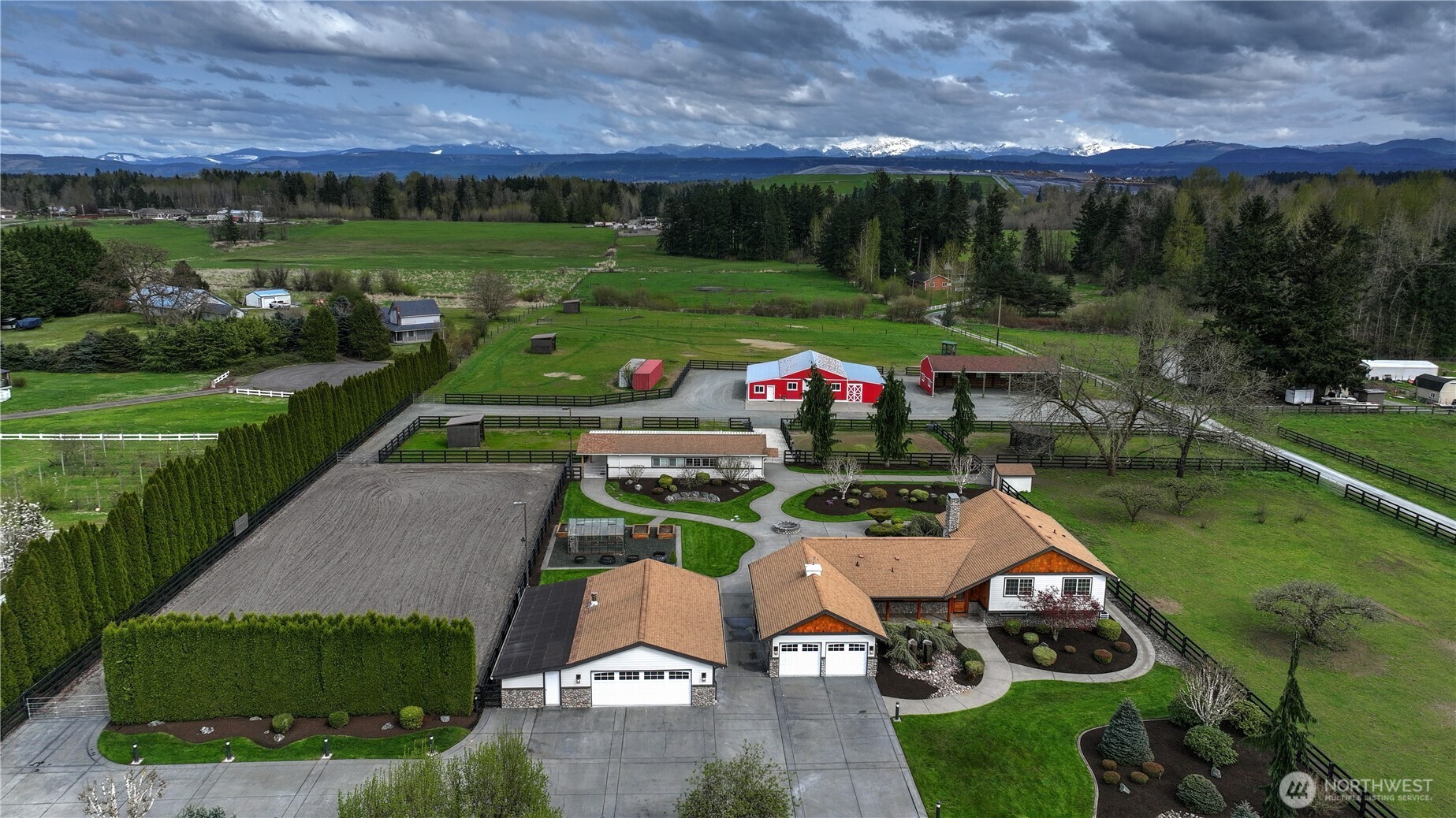30815 Webster Road East Eatonville, WA 98328 - Photo 1 of 40 an aerial view of a house with swimming pool garden and outdoor seating