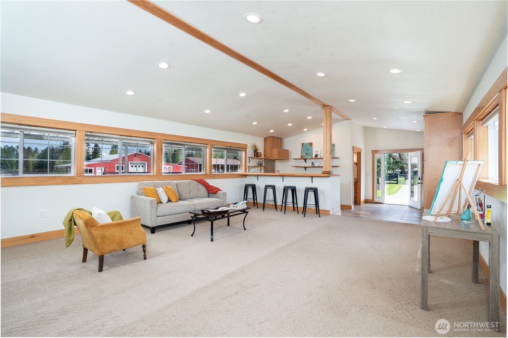 30815 Webster Road East Eatonville, WA 98328 - Photo 22 of 40 a living room with furniture and a flat screen tv